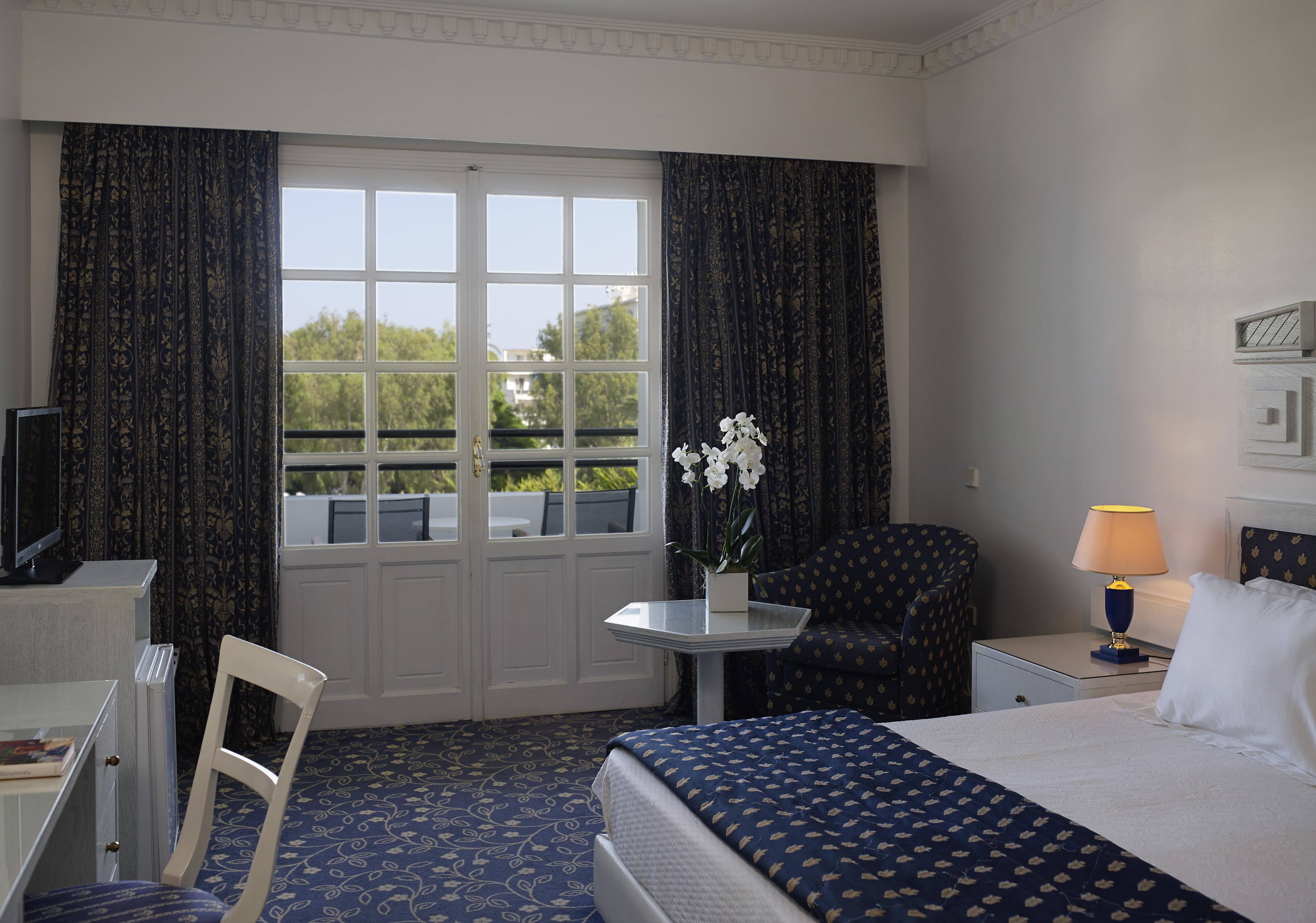 Mitsis Grand Hotel Rhodes City Exterior foto A room at the hotel