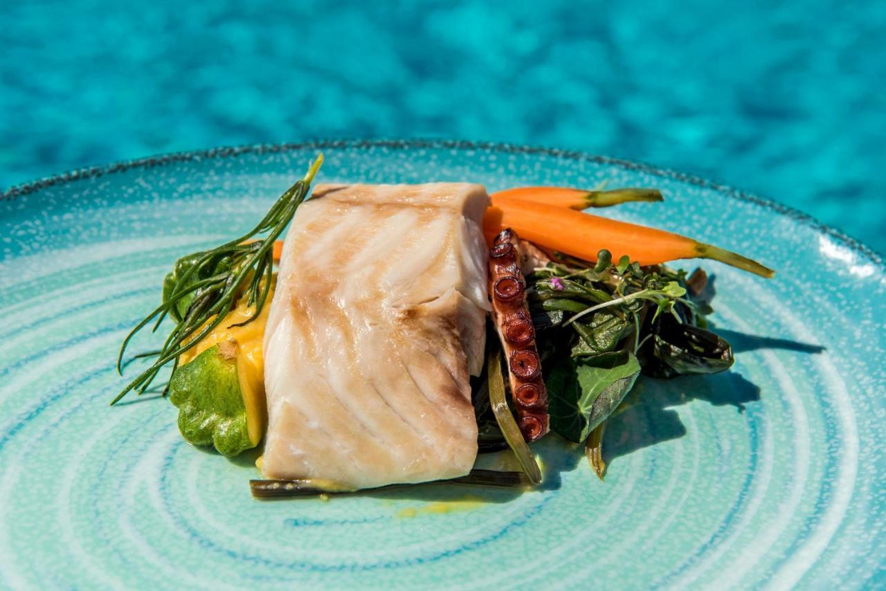 Mitsis Grand Hotel Rhodes City Exterior foto A prepared fillet of halibut